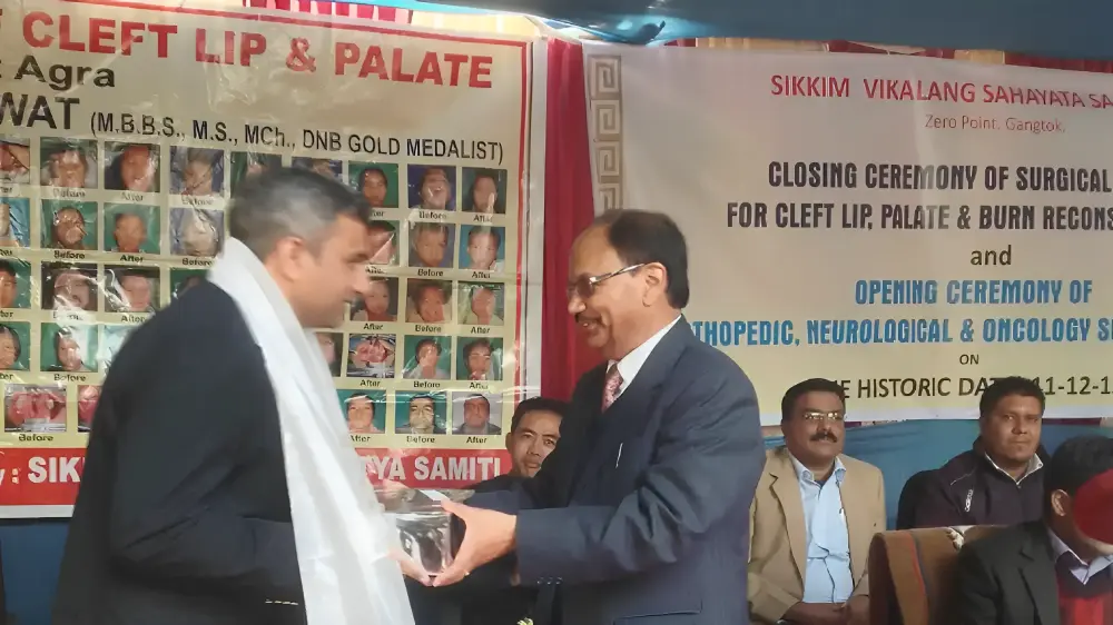 Dr. Satya Saraswat getting the recognition for the Free Plastic & Reconstructive Surgery Camp at Gangtok, Sikkim.